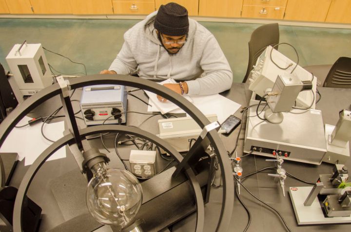 Lincoln University student studying in lab